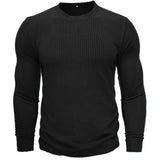 Pull militaire noir en maille côtelée à col rond, vu de face