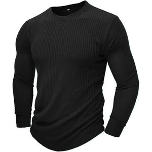 Pull militaire noir vu de trois quarts, manches longues et bas en bord-côte